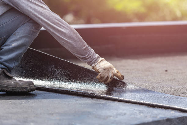 Professional Basement Waterproofing technician working in Bloomingdale, MI